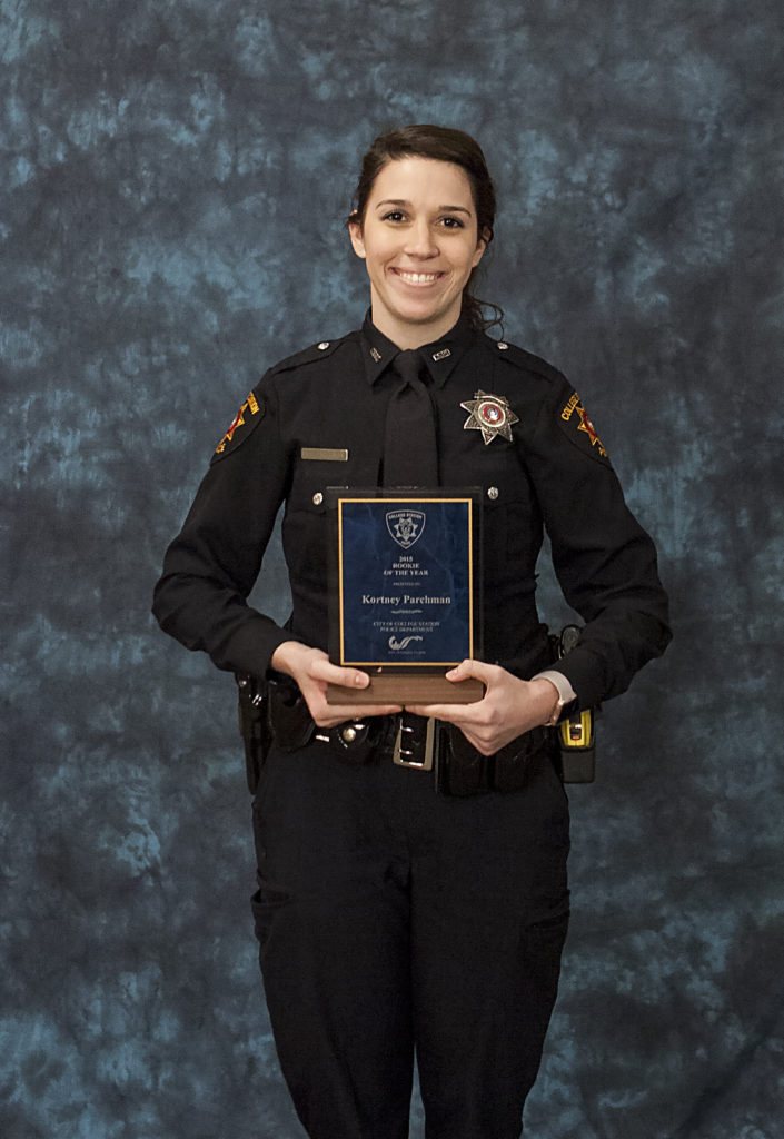 Kortney Parchman with the Rookie of the Year Award from CSPD. Photo by Jon Carpenter.