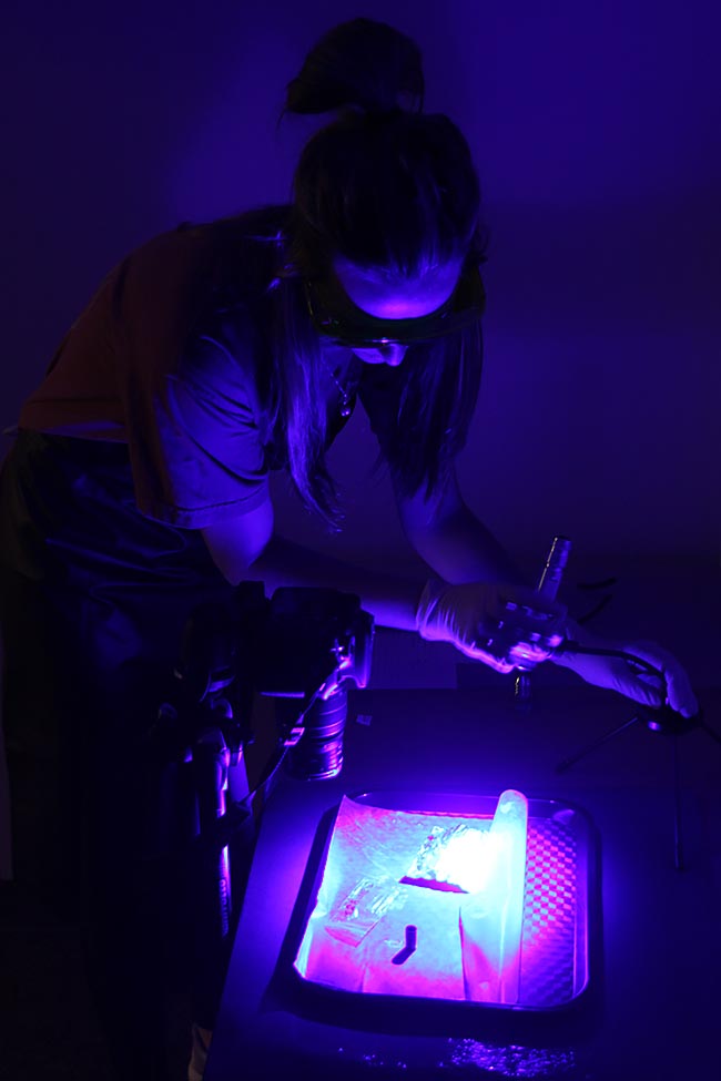 Michelle Jonika working with alternative light sources. 