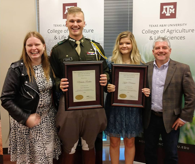 Nicholas Richter and Kylee Morrison, center, received the College of Agriculture and Life Sciences' Senior Merit Award during the College's Spring Convocation. Photo by Rebecca Hapes